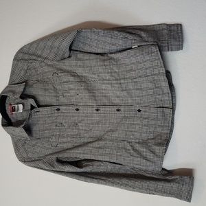 The North Face size small. Button down checkered long sleeve shirt.